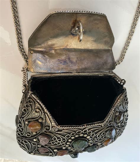 vintage metal purse with stones.